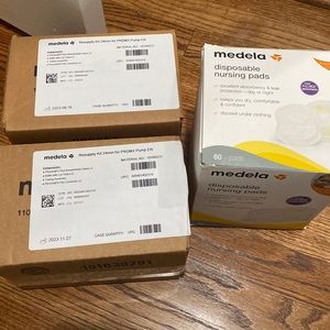 Medela resupply kit (2) and brand new unopened disposable nursing pads